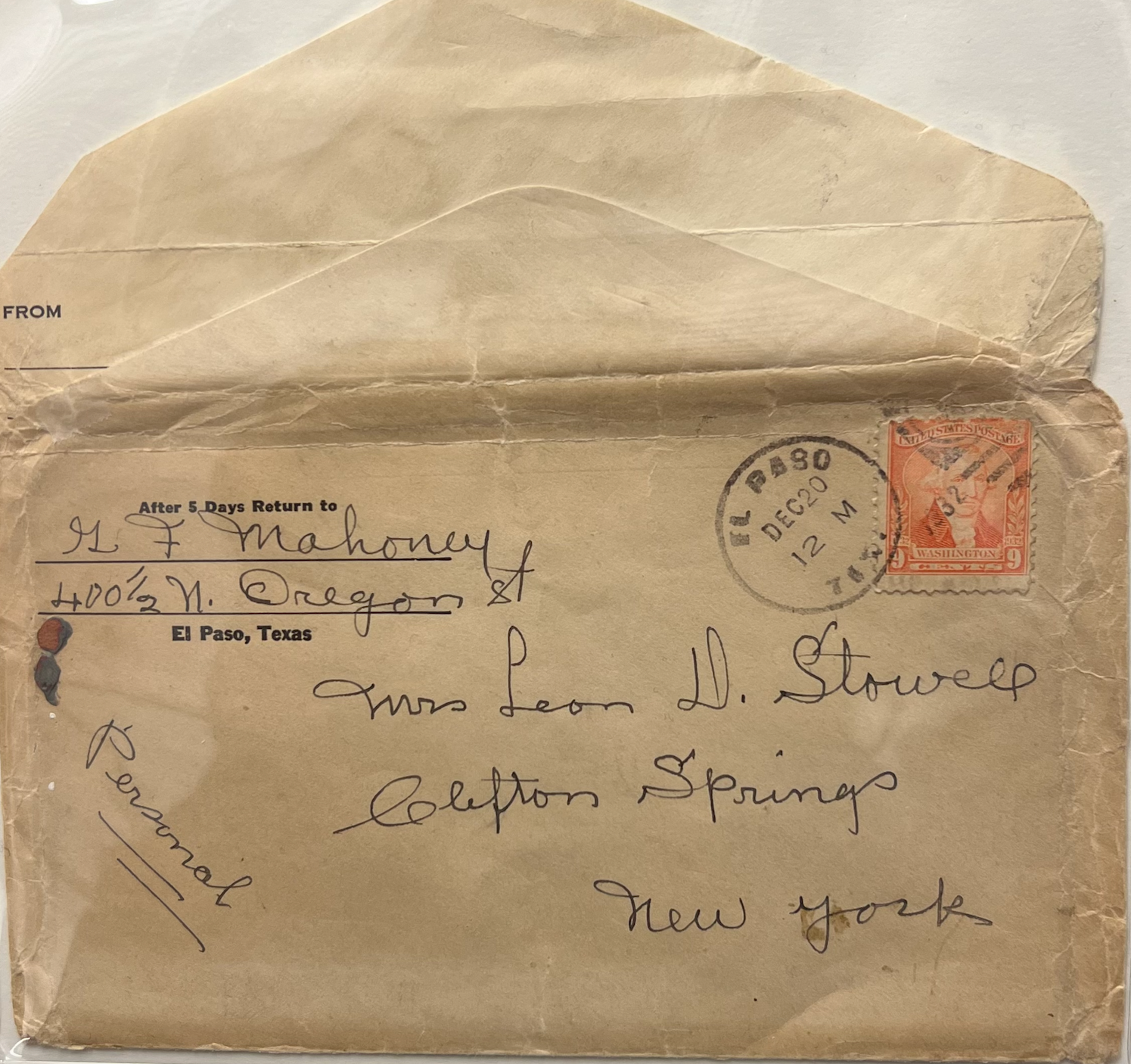 The light brown envelope encloses the journal and multiple-page entries from the Geo F. Mahoney journal (written in both print and cursive). They record the travel experiences and the letter of correspondence concluding the journal written for Mrs. Leon D. Stowell.